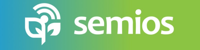 The logo and logotype for Semios against a blue-to-green gradiant background